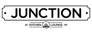 a black and white logo for Junction Kitchen and Lounge